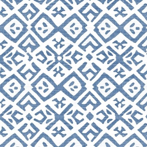 Boho Rubber Blockprint Off-white ornaments on blue with linen structure - medium scale