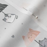 Cats and Umbrellas