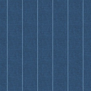 Chambray denim pin stripes on a 2" wide indigo blue, faux denim woven textured background. 