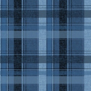 Medium - Chambray, indigo and stonewashed denim blue stripes create a plaid or tartan effect. 