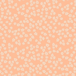 Small Ditsy Flowers on Peach Fuzz Background