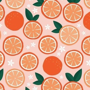 Slices or oranges and citrus blossom - summer fruit garden design on pink