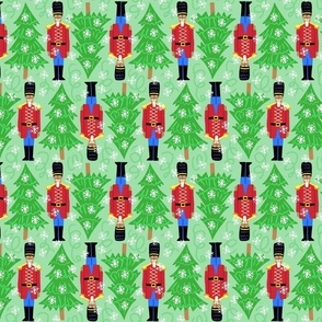 nutcracker and trees on green