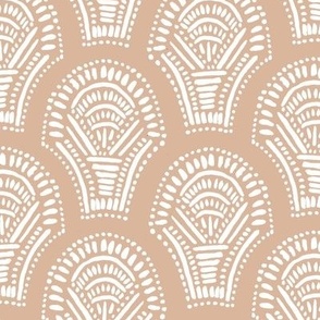 Scalloped geometric block print with a hand drawn feel in peach and white