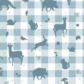 Woodland animals teal blue silhouettes pattern on tartan checkered background