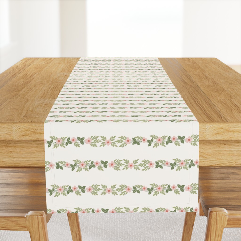 whimsical stripes of delicate flowers in soft pink and green on ivory 