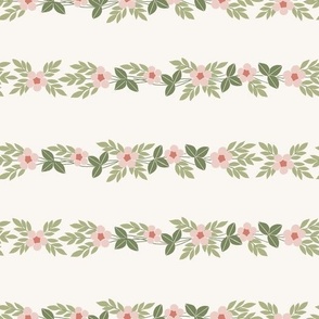 whimsical stripes of delicate flowers in soft pink and green on ivory 