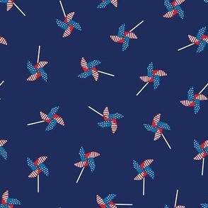 Tossed Red White and Blue Pinwheels on navy