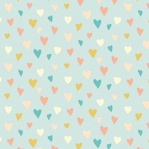 tiny hearts · multicolored on mint, retro