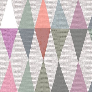 Half square triangles as diamonds in muted pinks and greens