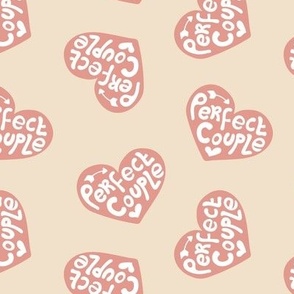 Perfect couple - groovy vintage style wedding design typography text on hearts with arrows orange cream 