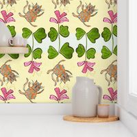 Large leaping scaredy cat and pink honeysuckle on a striped cream and yellow background