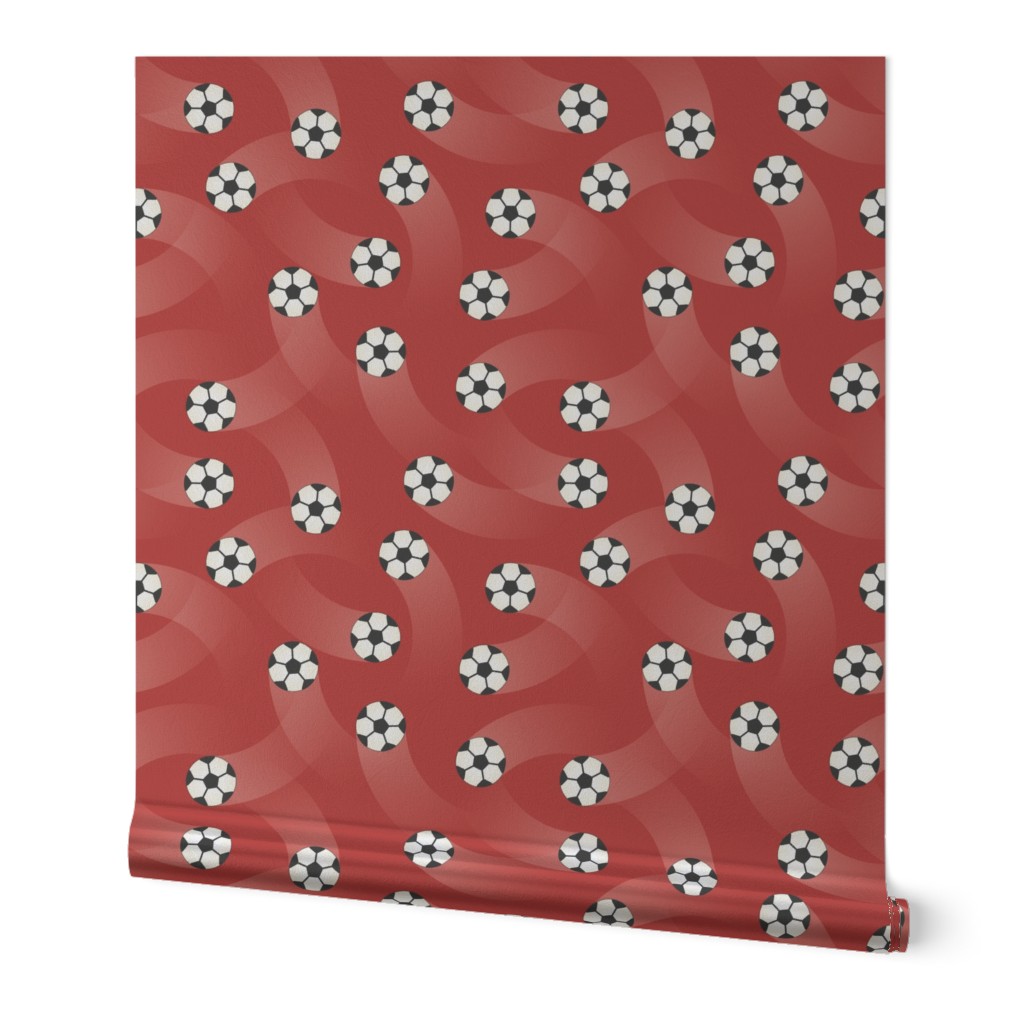 (L) Soccer balls on red background