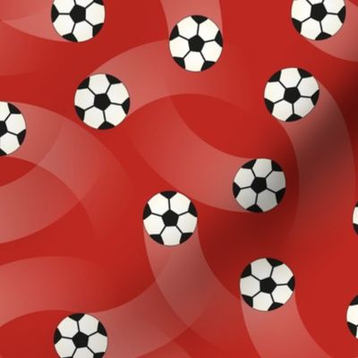(M) Soccer balls on red background