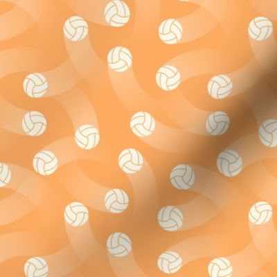 (S) Volleyball balls on orange background