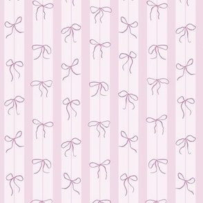 (S) Coquette pink bows on a vertical stripes background
