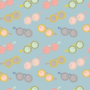 Decorative floral glasses with baby blue background