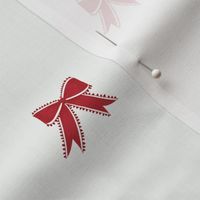 Small Benjamin Moore Exotic Red and Heritage Red Ribbon Bows on Super White Background