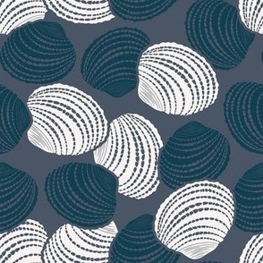 Seashells in white and dark blue - tossed design on blue background 