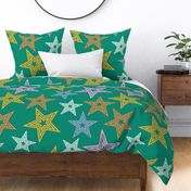 multi coloured  stars on green - disco rainbow stars - retro stars 