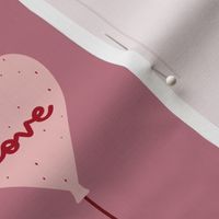 Large Valentine's Day Heart Balloons on Mauve
