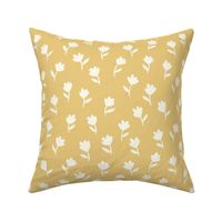 Playful Wildflowers: Minimalist Floral Silhouettes on a Mustard Yellow Background