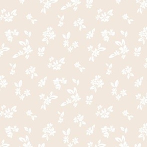 Neutral beige small flowers. Nursery floral ditsy.