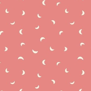 Small scale folk art moon scatter print in coral red