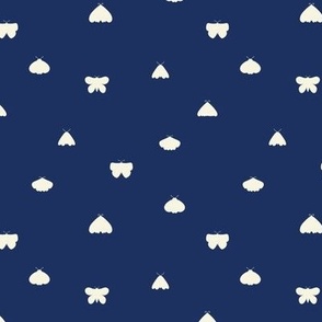 Folk style moth and butterfly silhouettes in navy blue