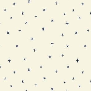 Small scale folk art style stars in the night sky in cream and navy blue