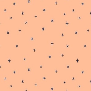 Small scale folk art style stars in the night sky in peach fuzz and navy blue