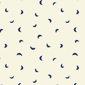 Small scale folk art moon scatter print in cream and navy blue