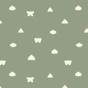 Folk style moth and butterfly silhouettes in sage green and cream