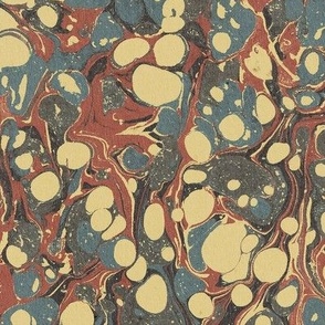 paper marbling red, blue and yellow
