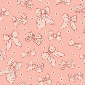 Small Cute Ribbon Bows and Ditsy Daisy Flowers in Soft Pink on Girly Peach Melba with Red