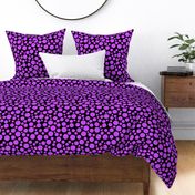  purple polka dots on black background