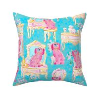 Staffordshire dogs and French furniture in pink and turquoise
