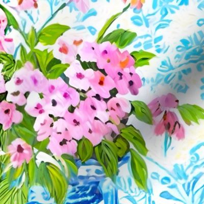 Pink daisies in blue classic urns