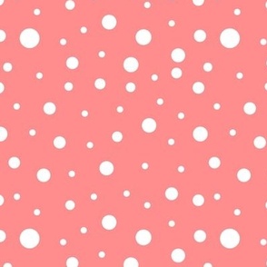 White scattered polka dots on pink