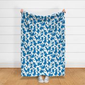 Cow Print in Blue on Cream Background