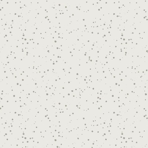 Warm Gray Dots Scattered on a Pale Background