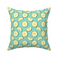 Pineapple slices on turquoise background