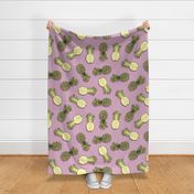 Pineapples, lilac background