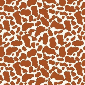 Cow print pattern brown on off white