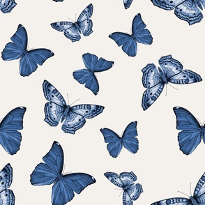 Tossed butterflies blue watercolor on cream - large scale