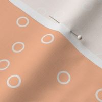 White Circles on Peach Fuzz background