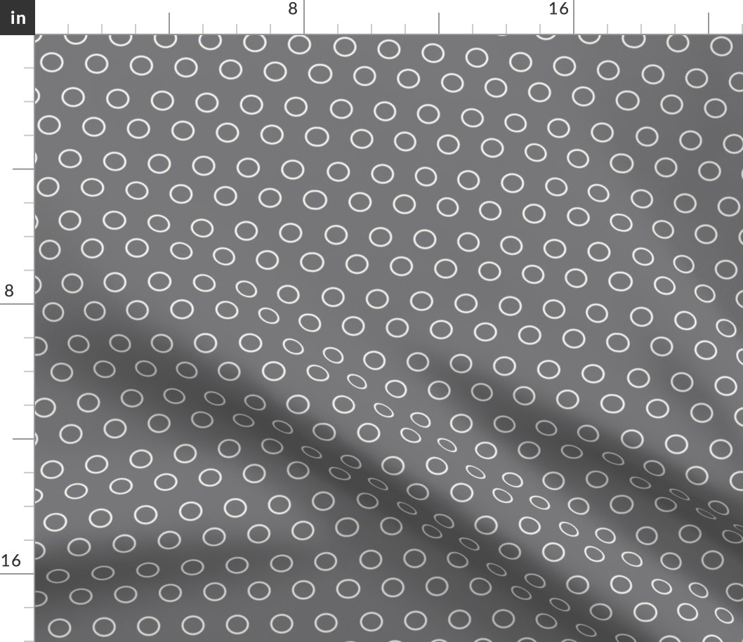 Graphic circles or open dots, white on gray.