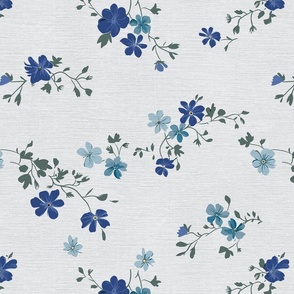 Anne's Ditsy Floral Meadow shades of blue on off-white linen backround - medium scale