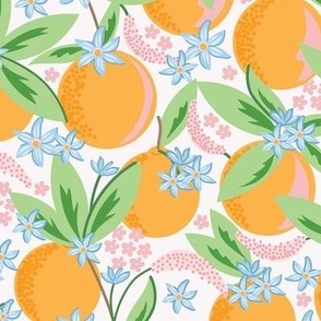 Small-Scale Clementine Oranges with blooms and citrus flowers with cream background
