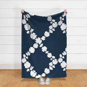 Jumbo Flower Trellis with white solid blossoms on dark blue